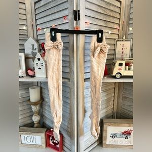 4 PAIRS of Ladies’ tall Boot Socks with adorable bow detail.